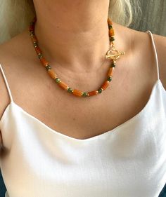 Statement Jade and Orange Aventurine Genuine Natural Stone Necklace.Chunky Gemstone Toggle Necklace. Handmade Gift for Mom, Wife or Girlfriend ☀️Dimension: 46cm 🌈Materials: Green Canadian Jade,Orange Aventurine,14k gold plated 🔴 30% Discount for 2 items use the code: 2ITEMS30 🔴 35% Discount for 3 or more items use the code: MOREITEM35 Visit my shop for all designs: https://www.etsy.com/shop/MervuHandmadeJewelry ✈️Trackable Shipping Necklace comes in a jewelry box 💎Made from high-quality materials. This necklace is designed to be suitable for your use for many years to come.  Avoid direct contact with perfume, lotions and chemicals. 🍀Thank you so much your shopping 💜If you have any questions or request you can send me message at any time :) 💙 Please don't forget to favorite my shop s Toggle Necklace With Round Beads For Gifts, Handmade Toggle Necklace With Round Beads As Gift, Handmade Toggle Necklace As Gift, Handmade Adjustable Toggle Necklace As Gift, Handmade Adjustable Toggle Necklace For Gift, Beaded Toggle Necklace With Round Beads As Gift, Beaded Toggle Necklace With Round Beads, Beaded Necklaces With Round Beads And Toggle Clasp, Gift Beaded Necklaces With Toggle Clasp And Round Beads