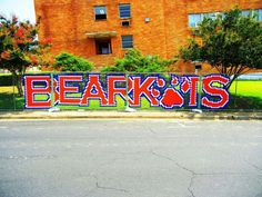 there is a sign that says bear k'ts on the side of the street