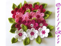 crocheted flowers are shown in pink, white and green