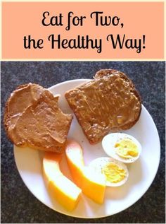 a white plate topped with eggs and toast next to an orange wedge on top of a table