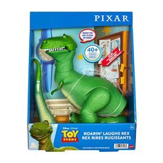 the toy story dinosaur playset is in its box and it's green with an open mouth