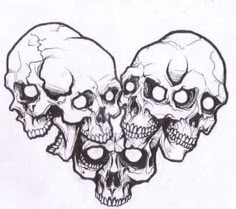 three skulls with their heads facing each other