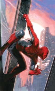 the amazing spider - man is hanging upside down from his high rise in an urban setting