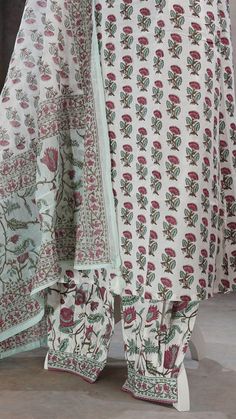 This is 3 piece set. The set consists of floral kurta with pockets , embroidered v neck, 3/4th sleeves & calf length teamed with printed white salwar & cotton dupatta. Floral Print Suit, White Salwar, Cotton Dupatta, Suit Set, Indian Wear, Online Retail, Indian Fashion, 3 Piece, Floral Print