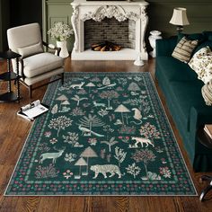 a living room filled with furniture and a rug on top of a hard wood floor