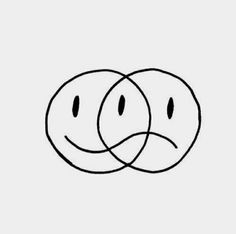 two circles with faces drawn in the middle