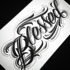 an inked piece of paper with the word boo on it