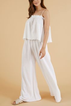 Walk into your day with our soft and light-weighted cotton Skye Palazzo Pants White, designed to make you feel confident and relaxed throughout your day. Feel at your best silhouette with these loose-fitting lounge pants featured with elasticated high waist to accentuate your natural waist. - 100% Turkish cotton- One size fits most- Elasticated waist Paper Bag Pants, Bag Pants, Bohemian Summer, Sustainable Shopping, Summer Design, Pants Design, Cute Top, Mens Fashion Trends, Palazzo Pants