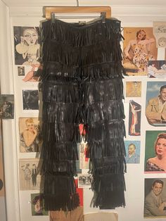 "So fabulous and hard to find! I've never seen pants like this and don't see an exact pair like this for sale any where online! A statement pair of pants to wear for the rest of your life- on the red carpet or for a quick Starbuck drop in.  By the exclusive vintage label Jean Paul Gaultier. Circa 1990's. Size 40. 100% genuine leather. Amazing condition! CONDITION: Expect to find normal signs of vintage wear/age with no significant issues. Some of the leather fringes are \"bent\" from storage and need to \"fall out\". Overall, the item is in good vintage condition. Please view all photos. THANK YOU, KANSAS CITY! We're honored to be nominated by The Pitch magazine in TWO categories this year for \"Best of KC\" 💥 BEST of KC: Vintage Clothing Store 2️⃣0️⃣2️⃣1️⃣ & 2️⃣0️⃣2️⃣2️⃣ 💥 BEST of KC: V Vintage Jean Paul Gaultier, Fringe Pants, Vintage Clothing Store, Vintage Fringe, Vintage Clothing Stores, Vintage Labels, Vintage Magazine, Leather Fringe, Paul Gaultier