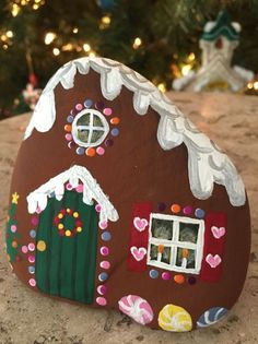 a gingerbread house is decorated with candy