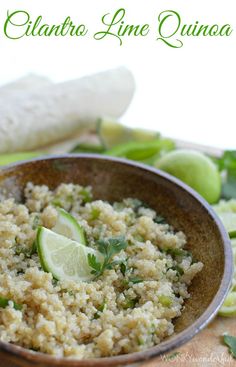 a close up of a bowl of food on a table with celery and limes