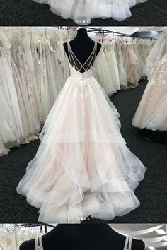 wedding dresses on display at a bridal shop