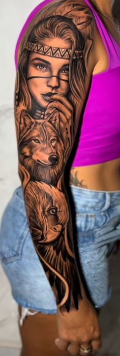 a woman with a wolf tattoo on her arm and half - sleeved shirt is shown