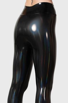 DARKWAVES & RAVES.- Statement rainbow hi-shine leggings.- Light stretch PU.- High waisted.- Elasticated waistband.- Fitted.Model is 5ft 7 and wears a size XS.with KILLSTAR branding, 100% PU 95% Polyester 5% Elastane. Metallic Shiny Fitted Leggings, Trendy Stretch Metallic Leggings, Iridescent Fitted Disco Bottoms, Pvc Leggings, Leather Leggings Fashion, Vinyl Leggings, Latex Lady, Shiny Pants, Latex Leggings