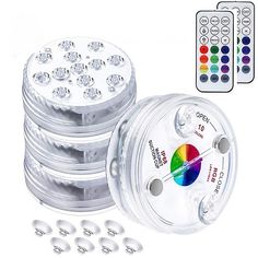 a set of six different colored lights with remote controls