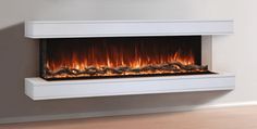 an electric fireplace in a room with wood flooring