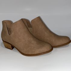 B.O.C Light Brown/Beige Suede Block Heel Ankle Boots Size 10 Style: Block Heel Boots (Slip On) Color: Brown Size: 10 Block Heel: 2” Suede Exterior Brand New All Items Come From A Pet Free And Smoke Free Environment. Beige Closed Toe Booties For Fall, Casual Beige Closed Toe Boots, Taupe Ankle-high Boots With Medium Width, Beige Flat Heel Boots With Reinforced Heel, Taupe Ankle-high Boots Medium Width, Beige Boots With Reinforced Flat Heel, Taupe Ankle Boots Medium Width, Beige Pointed Toe Casual Boots, Taupe Ankle Boots For Spring