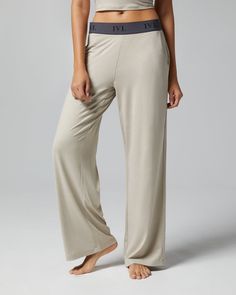 A stretch waist featuring a jacquard logo band tops this low-rise lounge pant. It’s made from heathered jersey with slash front pockets and a straight leg. IVL logo jacquard elastic waistband Low rise Slash front pockets Straight leg Heather jersey 96% Polyester 4% Elastane The Low Rise Lounge Pant is styled with the Scoop Tank. Morning Run, Cozy Boots, Hair Accessories Gift, Star Sneakers, Natural Deodorant, The Low, Fall Collections, Lounge Pants, Pullover Sweatshirts