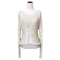 This Vintage Knit Top Features Shimmering Iridescent Scales. It Is In Good Vintage Condition With A Few Internal Stains And Pulls (Not Noticeable When Worn). Flat Measurements Are Shown In The Pictures. Questions? Please Comment Below. Features: - Lightweight Knit - Iridescent Sequins - Eye Catching Movement Size: Women’s Small Condition: Great Vintage Condition White Knit Party Sweater, Embellished Sweater For Spring Party, White Knit Sweater For Party, Long Sleeve Sequin Sweater For Party, Fitted Sequin Sweater For Party, Spring Party Embellished Sweater, Spring Fitted Sweater With Sequins, Fitted Spring Sweater With Sequins, Elegant Sequin Sweater