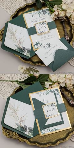 wedding stationery with green and gold accents on a tray next to lace doily