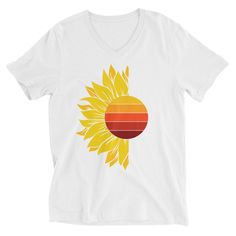 Lovin' the sun, complete with a sunflower companion! This unisex tee has a classic v-neck cut and fits like a well-loved favorite.  * 100% combed ring-spun cotton * Pre-shrunk fabric * Regular fit unisex sizing * Side-seamed construction * Blank product sourced from Nicaragua, Guatemala, or the US This product is made especially for you as soon as you place an order, which is why it takes us a bit longer to deliver it to you. Making products on demand instead of in bulk helps reduce overproduction, so thank you for making thoughtful purchasing decisions! Sun T Shirt Design, Summer Cotton T-shirt With Sunflower Design, White Sunflower T-shirt For Summer, Summer Cotton T-shirt With Sunflower Print, Yellow Short Sleeve T-shirt With Sunflower Design, Iron Decor, White T Shirt, White Top, White Tshirt