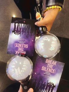 someone is holding up two book covers for the movie, break the science age clock