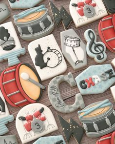 decorated cookies with musical instruments and symbols on them