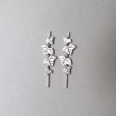 Beautiful Ivy inspires these special woodland stud earrings leaves on a branch. They attract much attention since they're very special, and are also great to wear every day You can order them in sterling silver or in in gold plated silver with a lovely matte finish. They come with silicone+ silver backs. The maximum size of each earring is 1.52 \ 0.4 inches ( 3.9 \ 1 cm ) These earrings are "made to order" so please allow me up to 1 - 4 weeks to make them Wire Leaves, Woodland Earrings, Leaves Earrings, Ivy Leaves, Ivy Leaf, Woodland Wedding, Leaf Earrings, Gold Plated Silver, Bridal Earrings