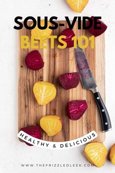 a wooden cutting board topped with beets next to a knife