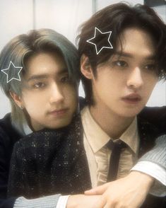 two young men with stars on their foreheads