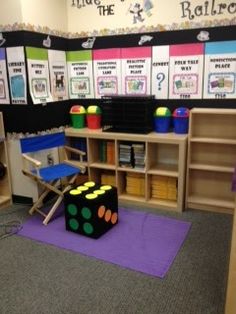 a classroom with toys and books on the floor