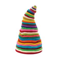 a multicolored knitted christmas tree on white background with clipping for text