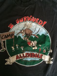 If you want an amazing vintage shirt, this is the perfect one for you. The print is awesome and who doesn't love camp stories? This shirt is in good condition but has two stains towards the bottom of the shirt, pictured. It is still an awesome piece of apparel and is soft and comfortable. Get it now. Measurements: Pit to pit: 18 3/4 inches Collar to bottom front: 23 inches Collar to bottom back: 24 1/4 inches Size on tag: Medium Cheap Vintage Camp Shirt For Summer, Cheap Vintage T-shirt For Outdoor Activities, Luxury Printed Camp Shirt With Camp Collar, Luxury Classic Summer Camp Shirt, Cheap Retro Camp Shirt For Streetwear, Cheap Retro Short Sleeve Camp Shirt, Cheap Vintage Printed Camp Shirt, Luxury Vintage Camp Shirt For Summer, Affordable Vintage Summer Camp Shirt