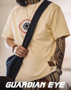 American Retro Guardian Eye Embroidered Cotton Men's T-Shirt - Harmony Gallery Look Retro, Skirt Co Ord, Eye Design, Tee Shirt Homme, Retro Look, Casual Tee, Haiti, Brunei, Beige Color