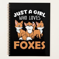 a spiral notebook with three foxes on it and the words, just a girl who loves foxes