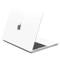 an apple laptop computer sitting on top of a white surface