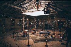 an empty room with lights and lighting equipment