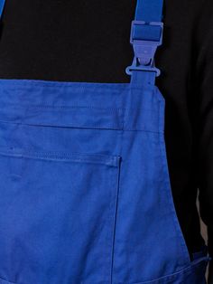 "Full and ready vintage 90's men work dungarees in indigo blue. Classic flap closure and durable fabric to accompany you on all kinds of works. Multiple front pockets. CONDITION: good vintage; has a spots here and there, see the last picture. MODEL is 6.4 ft (196 cm) tall, size XL - and he wears the size available. SIZE: Suggested size: L. To be sure the size will fit check the sizing details listed below. FLAT Measurements Side to side (waist): 16 1/2 \" / 42 cm Length: 51 \" / 129,5 cm Inseam: Garage Fashion, Vintage Suede Coat, Men Jumpsuit, Mens Sherpa, 90s Men, Jumpsuit Blue, Mens Overalls, Cardigan Oversized, Leather Outerwear