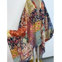 One Size fits S-4X Length: 52 inches Material: Chiffon (Sheer, soft and silky to the touch with a beautiful drape and flow) One Size Fits Most Size Chart Flowy Multicolor Printed Kimono, Flowy Multicolor Wrap Kimono, Multicolor Flowy Wrap Kimono, Flowy Multicolor Long Kimono, Multicolor Flowy Long Kimono, Multicolor Long Flowy Kimono, Multicolor Shawl Kimono For Beach, Multicolor Beach Shawl Kimono, Bohemian Silk Shawl For Summer