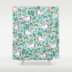 a shower curtain with unicorns and rainbows on it, in pastel colors