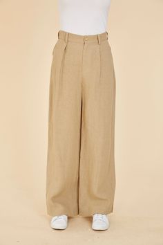 Indulge in breezy comfort with our Linen Wide Leg Pants. Lightweight and comfortable, these pants are the epitome of easygoing style. Their breathability makes them the perfect choice for spring, ensuring you stay cool while exuding effortless elegance. The wide leg adds to the casual vibe, making these pants a versatile and comfortable wardrobe staple for the season. Embrace the airy feel with every step in these spring-ready wide leg linen pants. Linen Wide leg Comes in White and Linen Match w Effortless Relaxed Fit High-waisted Pants, Relaxed Wide Leg Trousers For Spring, Effortless Wide-leg Bottoms With Pockets, Effortless Wide Leg Everyday Bottoms, Effortless Relaxed Fit Ankle-length Pants, Effortless Relaxed Fit Ankle-length Bottoms, Effortless High-waisted Loose-fit Pants, Effortless Relaxed Fit Bottoms, Effortless Spring Bottoms With Pockets