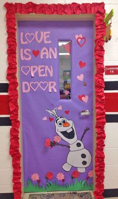 a door decorated with the words love is an open door and a frozen princess character