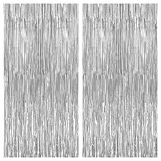 two silver foil curtains with fringes on them