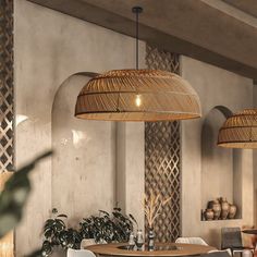 an indoor dining area with wicker lamps and chairs