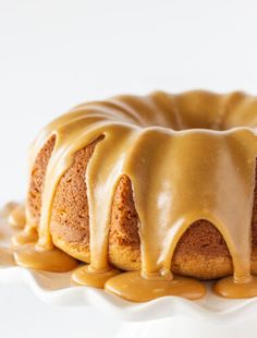 a bundt cake covered in caramel glaze