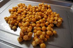 some chickpeas are sitting on top of a pan