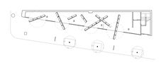 the floor plan for an office building, with several tables and chairs in it's center