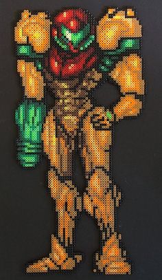 an image of a pixel art style character holding a green object in his hand and wearing yellow gloves