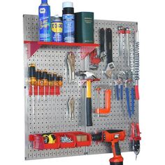 tools hanging on a pegboard in a garage