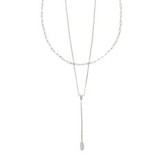 Want to try out the layered necklace look, but don't know where to start? Meet the Jaimee Multi-Strand Necklace. A chic combination of a classic chain and Y-shaped necklace, this two-in-one style lets you get in on the layering trend, effortlessly. Designer, founder, and philanthropist Kendra Scott started her company in 2002, just three months after her first son was born. Her commitment to innovation, quality, customer service, and detail has taken her from a small startup to a billion-dollar Double Strand Lariat Necklace With Clavicle Chain For Layering, Dainty Double Chain Lariat Necklace For Layering, Double Strand Lariat Necklace With Adjustable Chain For Layering, Chic Silver Lariat Necklace With Delicate Chain, Silver Lariat Chain Necklace For Layering, Double Chain Lariat Necklace For Layering, Silver Dainty Lariat Necklace For Layering, Silver Delicate Chain Lariat Layered Necklace, Double Strand Paperclip Chain Layered Necklace